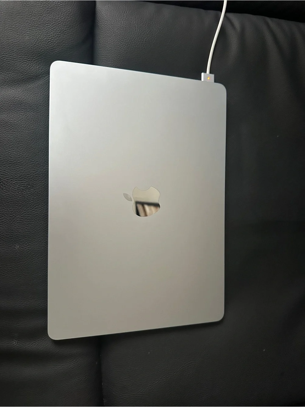 Space Gray Laptop with Black Keyboard & Autumn Leaf Display